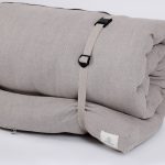 Nomad Heat Camping mattress, camping pad strapped up close
