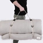 Nomad Heat Camping mattress, camping pad strapped with model