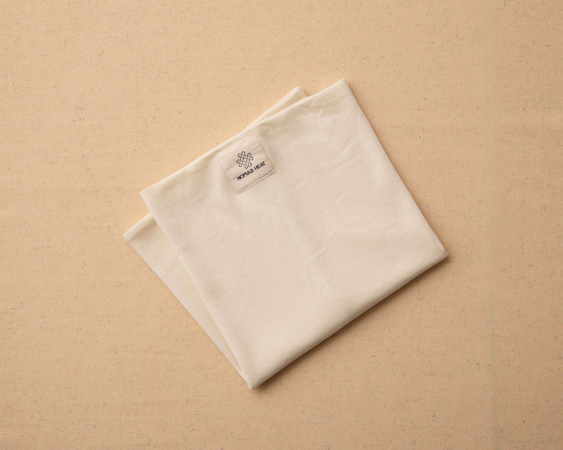 merino wool buff on beige background